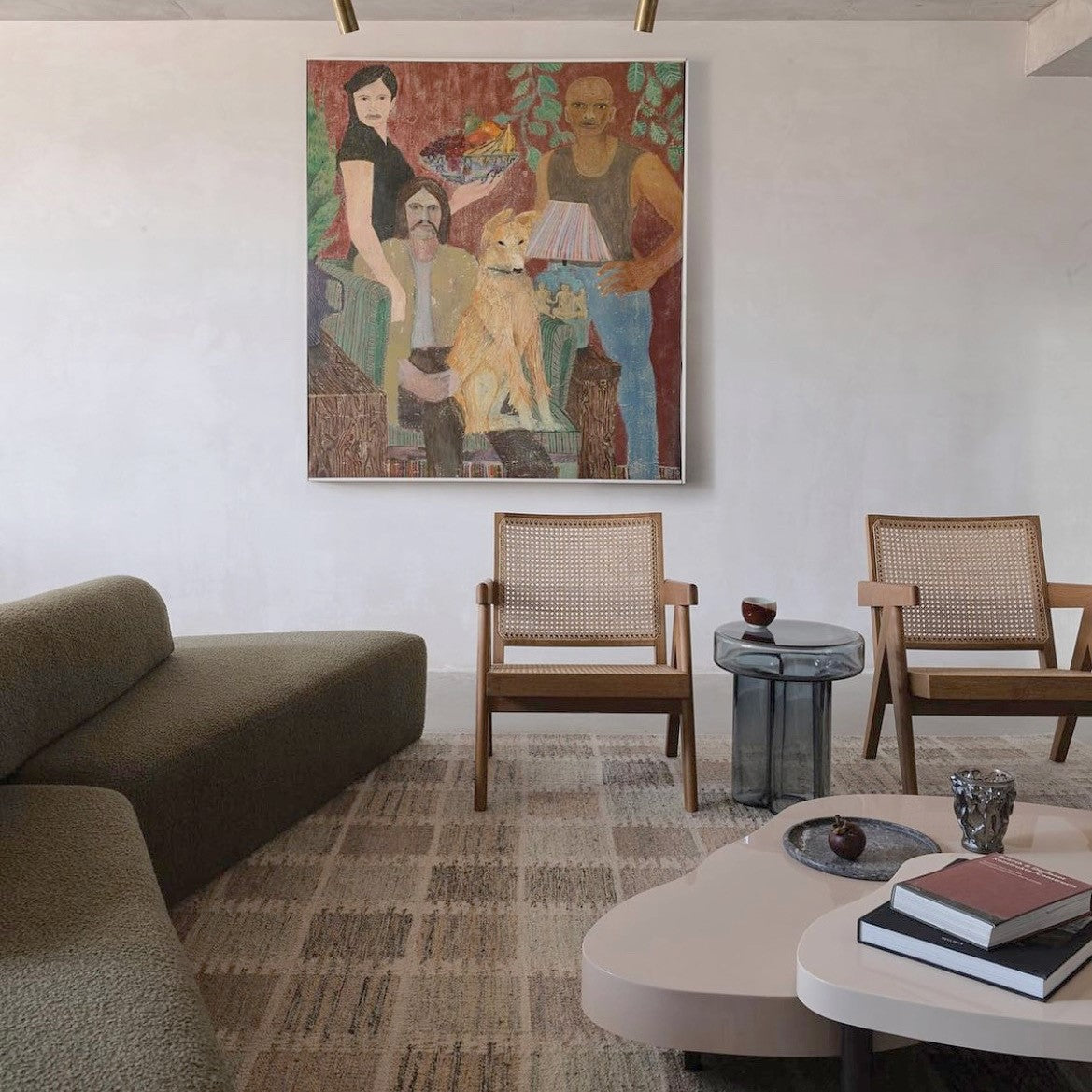 Scandi handwoven rug in lounge room with beautiful painting and furnitures