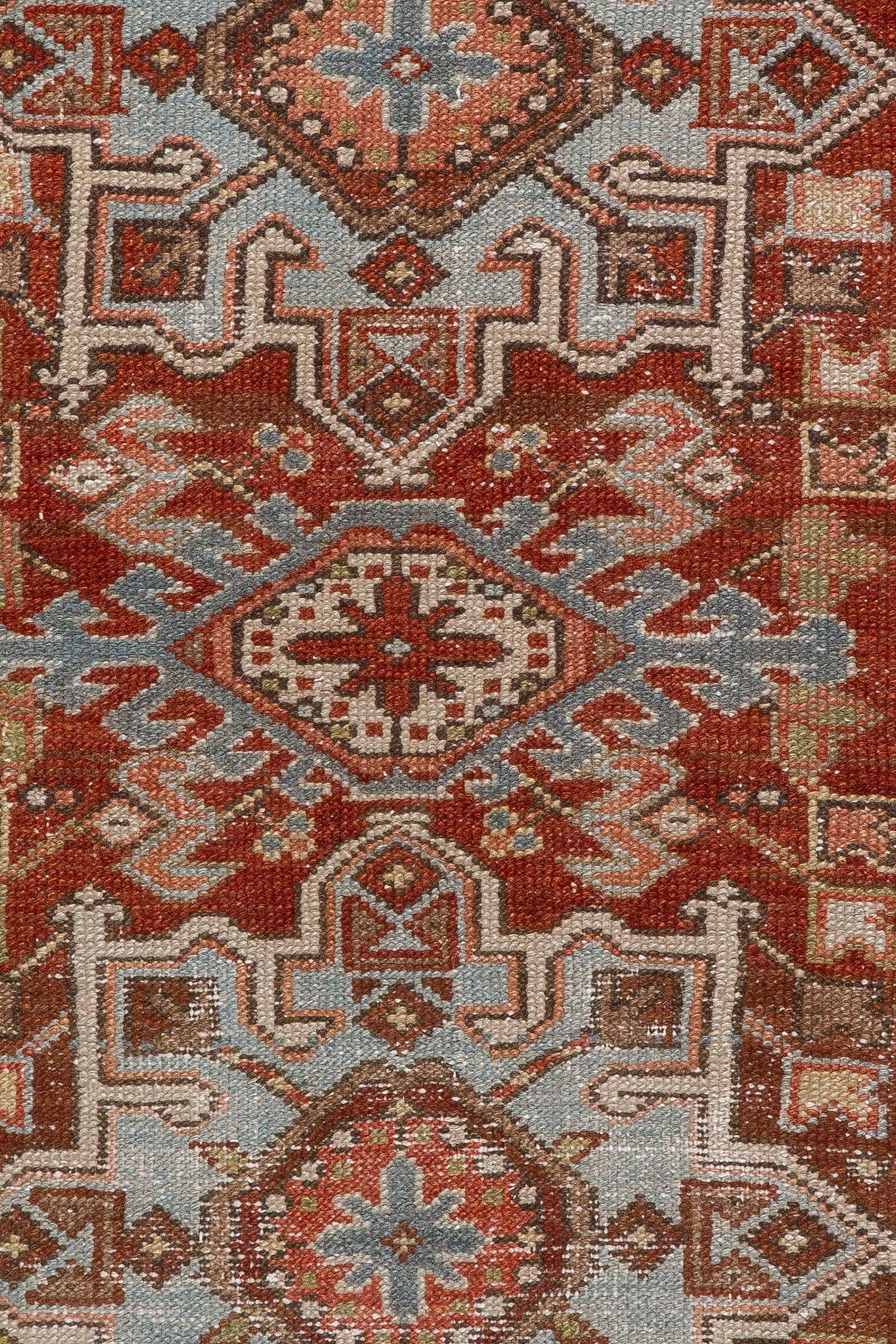 Handwoven Vintage Persian Heriz Small Classic Rug, made of wool, red, blue, terracotta and various beautiful colorful small handwoven carpet