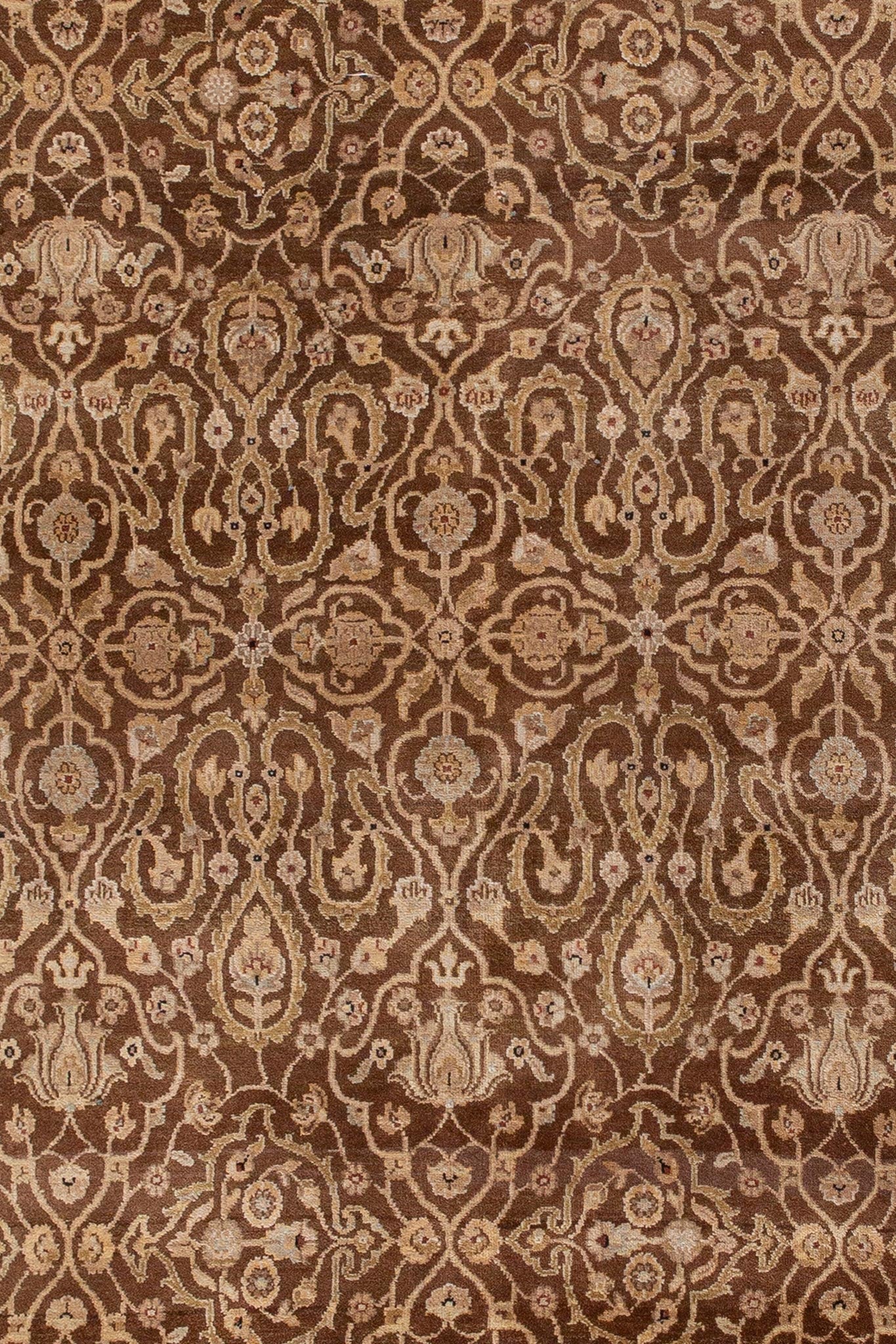Close up photo of handwoven rug, brown and gold floral rug, Indian Revival Bidjar