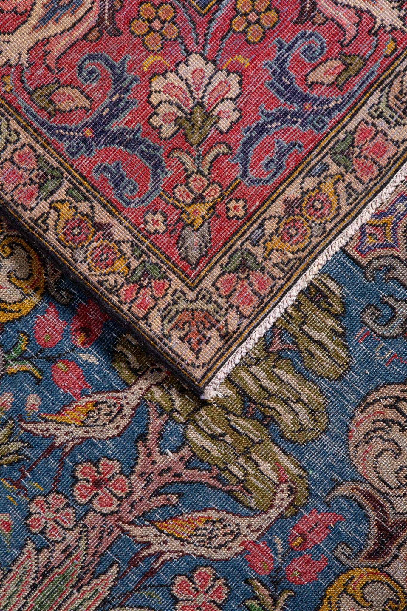 Back of handwoven rug called Antique Persian Bakhtiar, Intricate Persian floral design