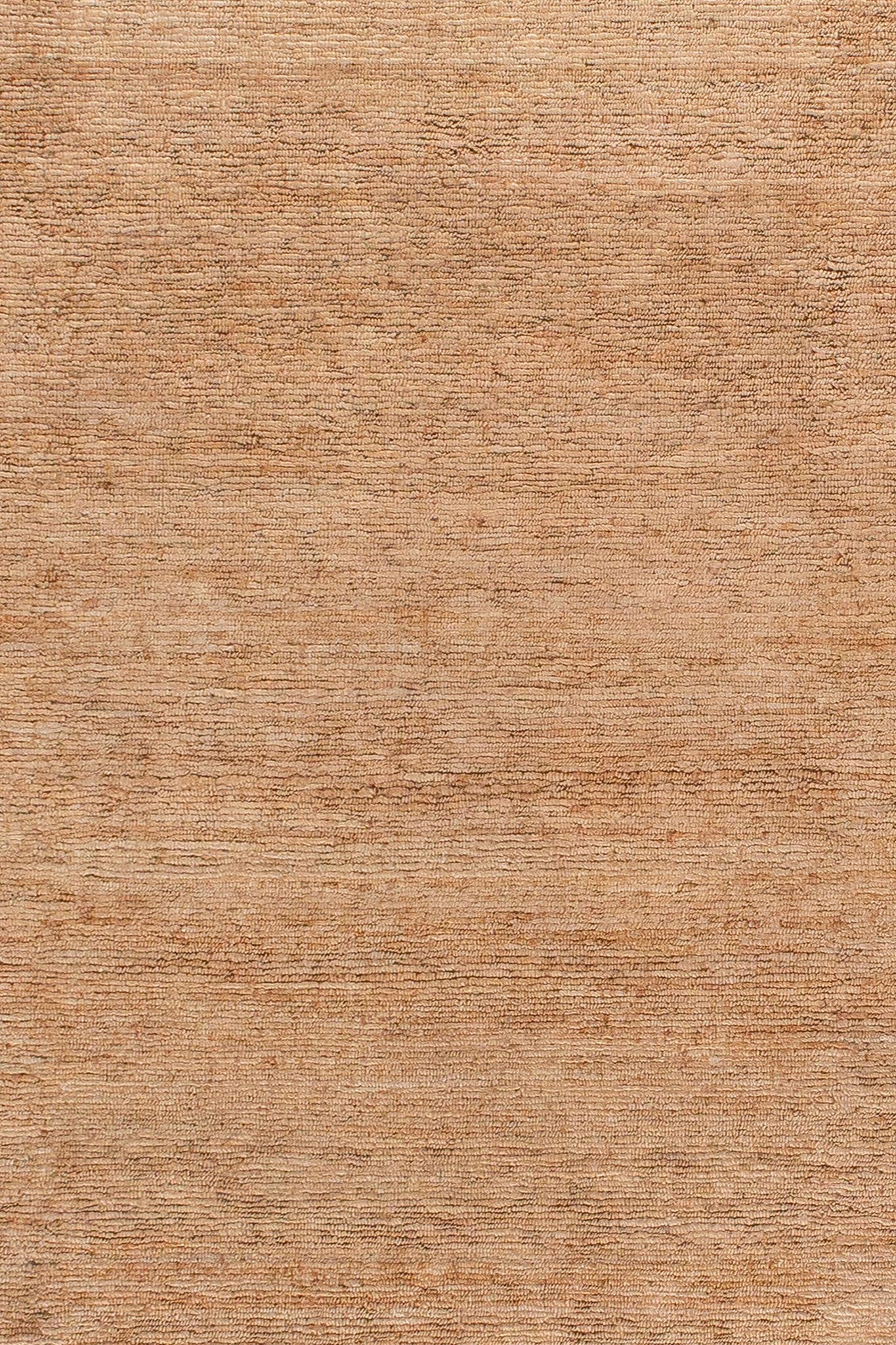 Close up photo of plain loop handwoven Jute Rug