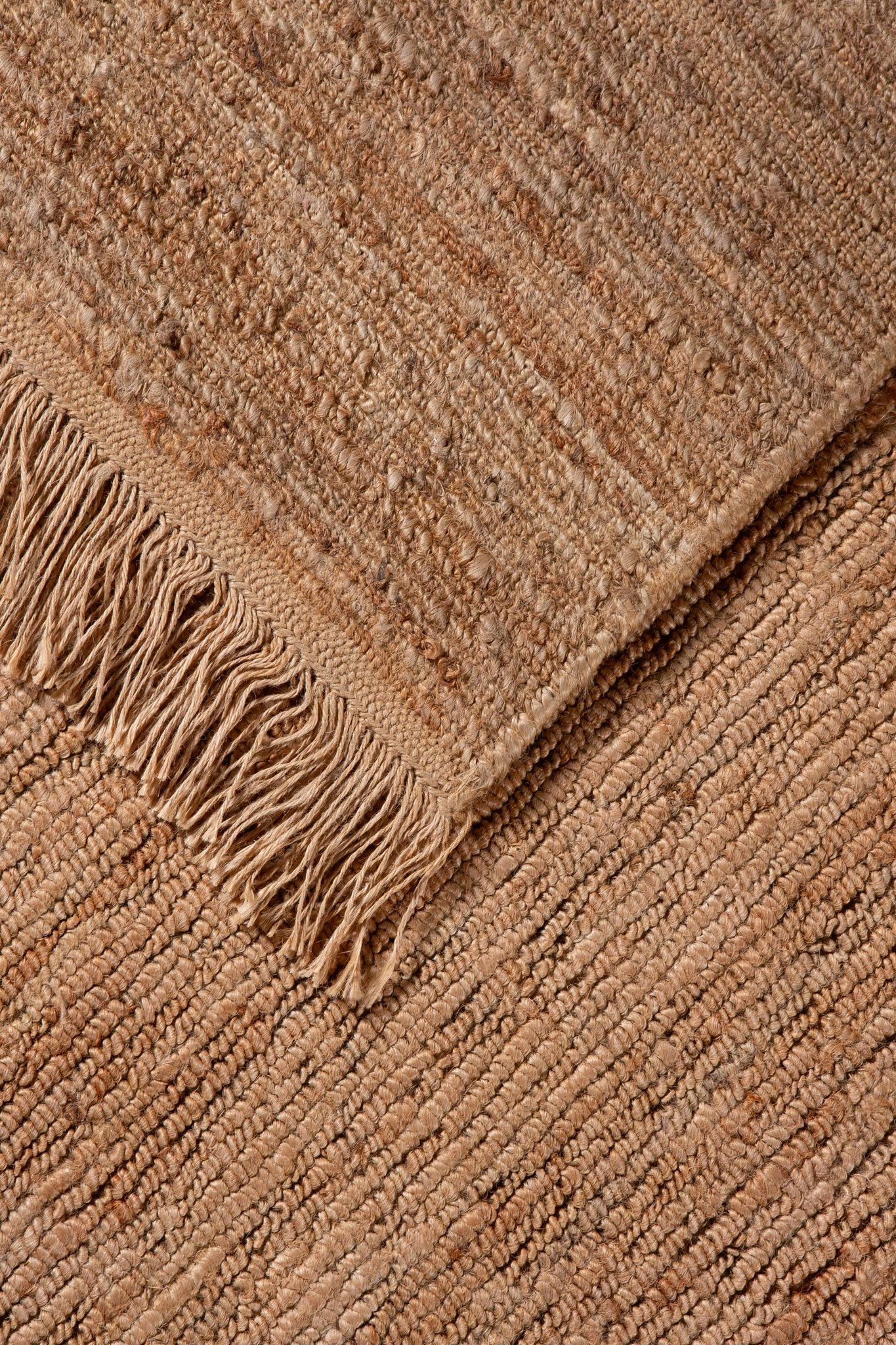 Back of plain loop handwoven Jute Rug