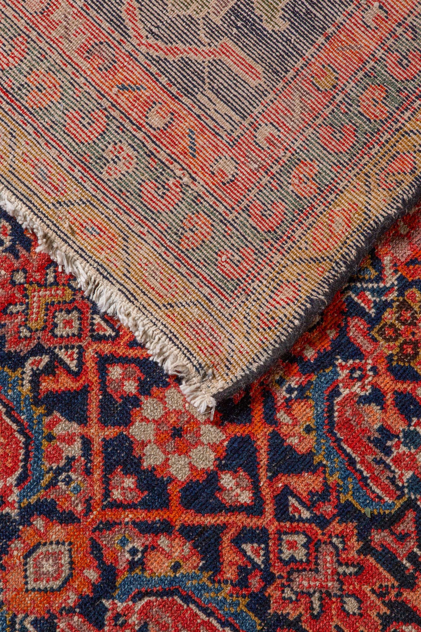 Back of handwoven rug called Antique Persian Bidjar